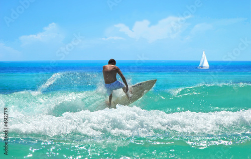 Surfer and Sail Boat