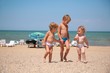 children walking on the beach