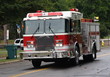 Fire Truck Rushes to the Scene of a house fire