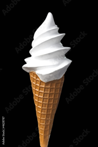 Soft ice cream isolated on black
