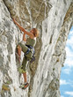 Teenager rock climbing