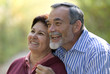 senior couple smiling outdoors