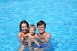 family in water