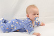 Baby in jammies on white backdrop Baby in jammies on white backdrop
