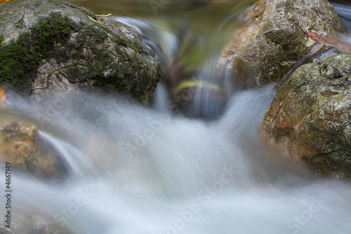 Photo: Rocks in a stream Rocks in a stream