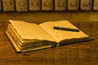 Open old diary or notebook with classic pen. Open old diary or notebook with classic pen.