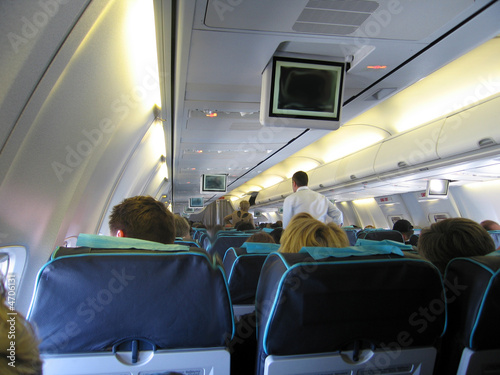 Photo: Passengers inside airplane Passengers inside airplane