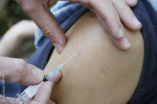 Photo: Taking the needle out Taking the needle out