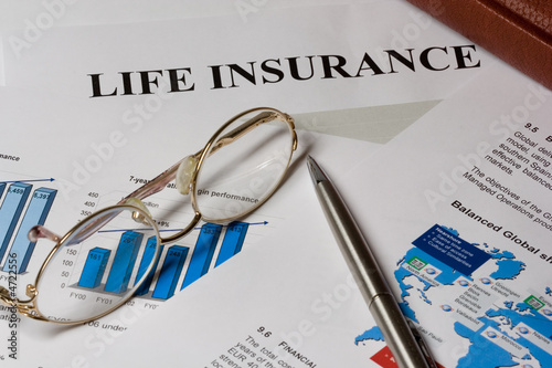 Photo: life isurance blank bar chart and glases life isurance blank bar chart and glases