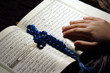 Photo: Worshiping hands & reading holy Koran book Worshiping hands & reading holy Koran book