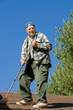 senior on a roof