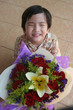Photo: Boy holding rose bouquet Boy holding rose bouquet
