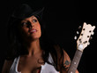 Photo: Beautiful latino rock chick with an electric guitar Beautiful latino rock chick with an electric guitar
