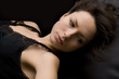 young woman lieing in black bed young woman lieing in black bed