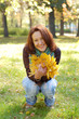 Smiling girl  in  autumn park