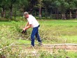 man using chainsaw