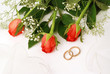 Wedding arrangement with rings and roses