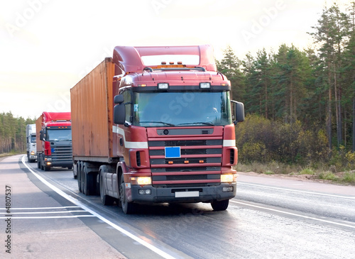 Photo: tractor trailer trucks caravan convoy line of "trucks" series tractor trailer trucks caravan convoy line of "trucks" series