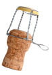 Cork of champagne bottle on white