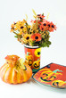 Hallowwen Flowers with a pumpkin and hallowween plate