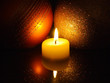 Christmas candle lights decoration with reflection in the water