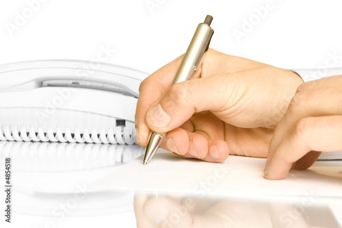 Foto: Hand and pen Hand and pen