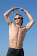 Muscular Man Holding Hands Up Muscular Man Holding Hands Up