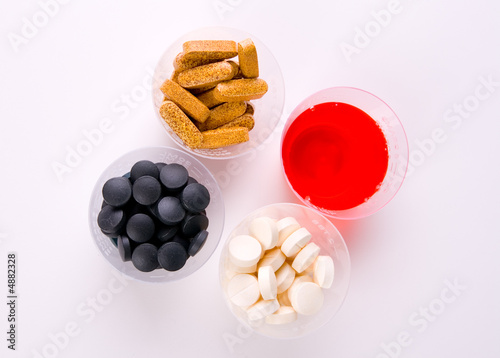 Photo: Medications in cup Medications in cup