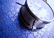 Alarm clock on jigsaw