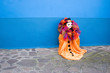 Foto: Orange clown - blue wall Orange clown - blue wall