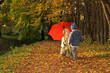 Mother and son in the autumn park
