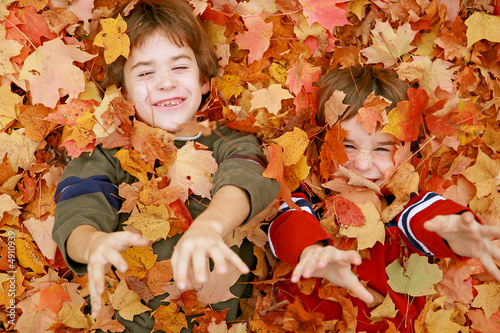 Boys Playing in the Leaves
