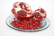 red pomegranate on the plate