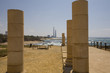 Columns of Caesarea with factory in background Columns of Caesarea with factory in background