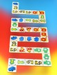 Wooden domino on  colorful background
