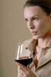 Woman tasting wine