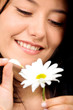 happy girl with a white flower