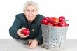 Grandma with red apples.