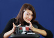Foto: Arabian girl with a lot of poker chips Arabian girl with a lot of poker chips