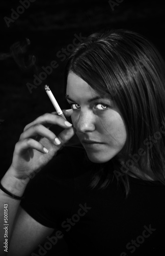 Photo: Girl smoking cigarette Girl smoking cigarette