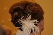bride brown hair up do style feather bun
