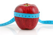 Red apple with measuring tape