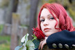 Closeup of redhead girl with a rose Closeup of redhead girl with a rose