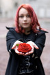 Closeup of redhead girl with a rose Closeup of redhead girl with a rose