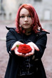 Closeup of redhead girl with a rose Closeup of redhead girl with a rose