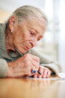 Senior woman writing Senior woman writing