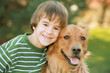Photo: Boy with Golden Retriever Boy with Golden Retriever