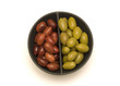 red and green olives on white background 