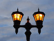 Retro street post with lighted two lamps