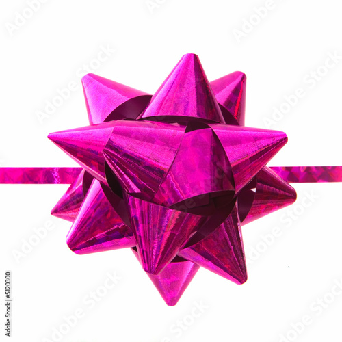Photo: Bow with lilac holographic ribbon. Isolated. Bow with lilac holographic ribbon. Isolated.